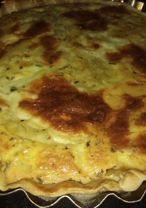 Una foto de Tarta de cebolla y quesos