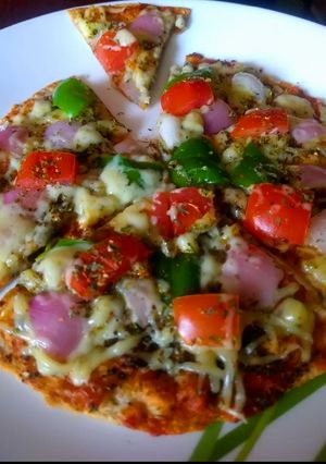 A picture of Thin Crust Roti Pizza.