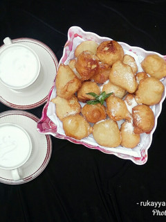 Puff puff with rice,graundnut and coconut pap ainihin hoton girkin