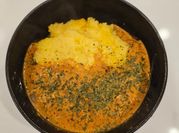 A picture of chicken with polenta