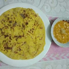Puran Poli with Aam ras A picture of Puran Poli with Aam ras.