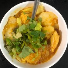 A picture of Idli curry.