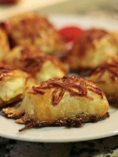 Una foto de Saladitos de hojaldre con queso de cabra y manzana