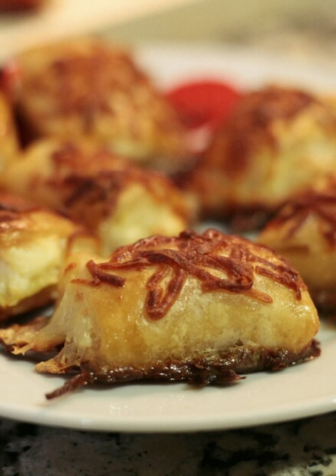 Una foto de Saladitos de hojaldre con queso de cabra y manzana