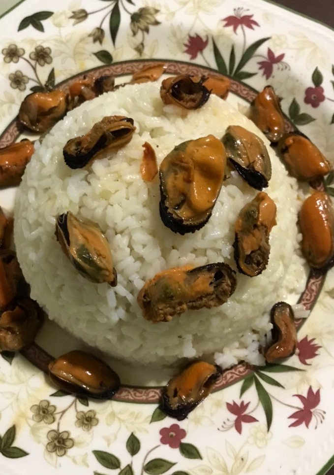 Una foto de Arroz con mejillones en escabelle