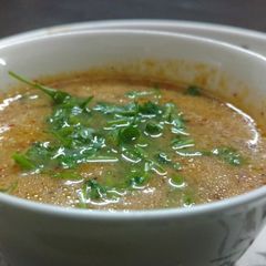 A picture of Cream of Baby corn soup.