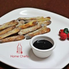 A picture of Baked Churros with choco dip.