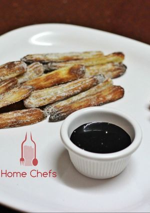 A picture of Baked Churros with choco dip.