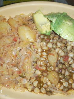 A picture of Githeri and steamed cabbage plus avocado.
