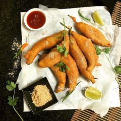 A picture of Egg Stuffed Mirchi Vada (Fusion style).