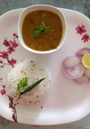 A picture of Mixed Dal Tadka and Jeera Rice.