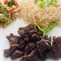 A picture of Teppanyaki Beef, Stir Vegetables and Garlic Rice.