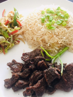A picture of Teppanyaki Beef, Stir Vegetables and Garlic Rice.