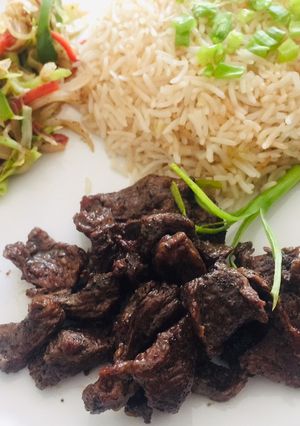 A picture of Teppanyaki Beef, Stir Vegetables and Garlic Rice.
