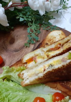 A picture of Cheesy vegetable  sandwich.