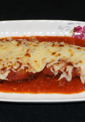 Una foto de Milanesa de carne a la parmesana