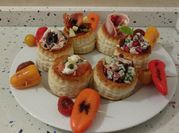 Una foto de canapé de manzana
