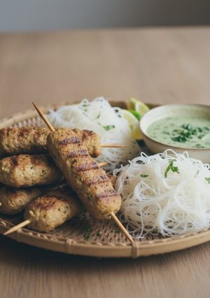 A picture of Aromatic Lamb and Vermicelli Skewers with Mint Dipping Sauce.