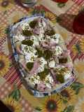 Pinsa gourmet mortadella, pesto di pistacchi, stracciatella e granella di pistacchi