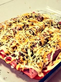 Una foto de Canelones de jamón york rellenos de verduras