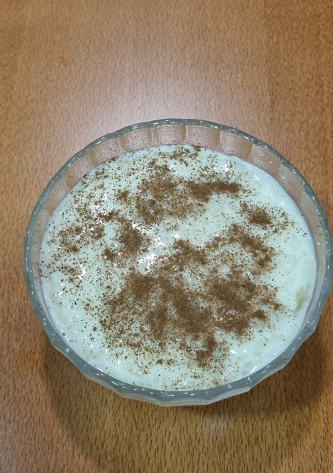 Una foto de Arroz con leche cremoso