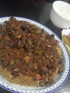 صورة لوصفة مقلوبه فول باللحم
