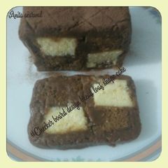 A picture of Checker board design bread loaf shape cake.