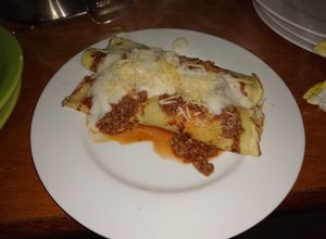Una foto de Canelones de acelga y carne molida