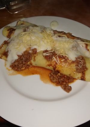 Una foto de Canelones de acelga y carne molida