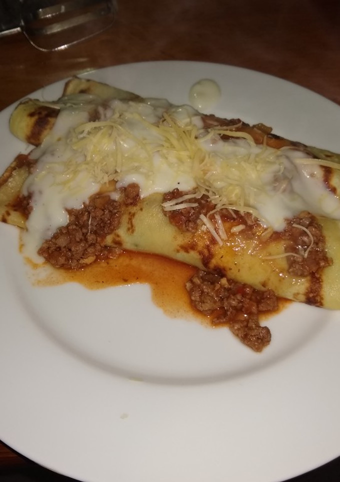Una foto de Canelones de acelga y carne molida