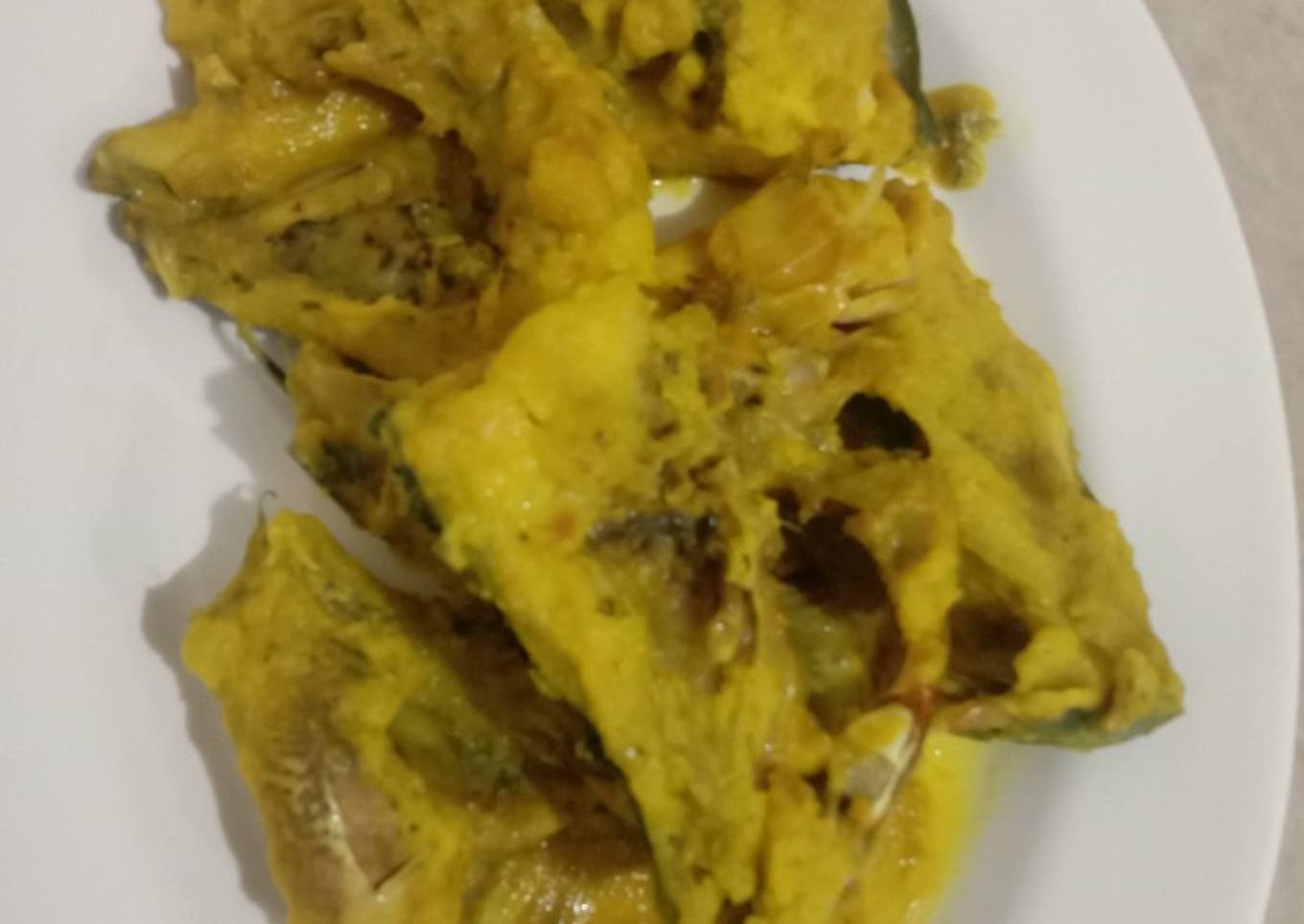 Kepala ikan bumbu kuning