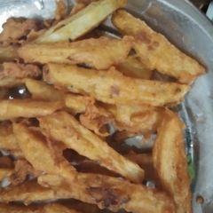 A picture of Fried potato fingers.
