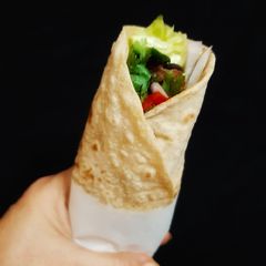 A picture of Kofta and cheese wrap.
