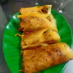 A picture of Noodle Schezwan Dosa.