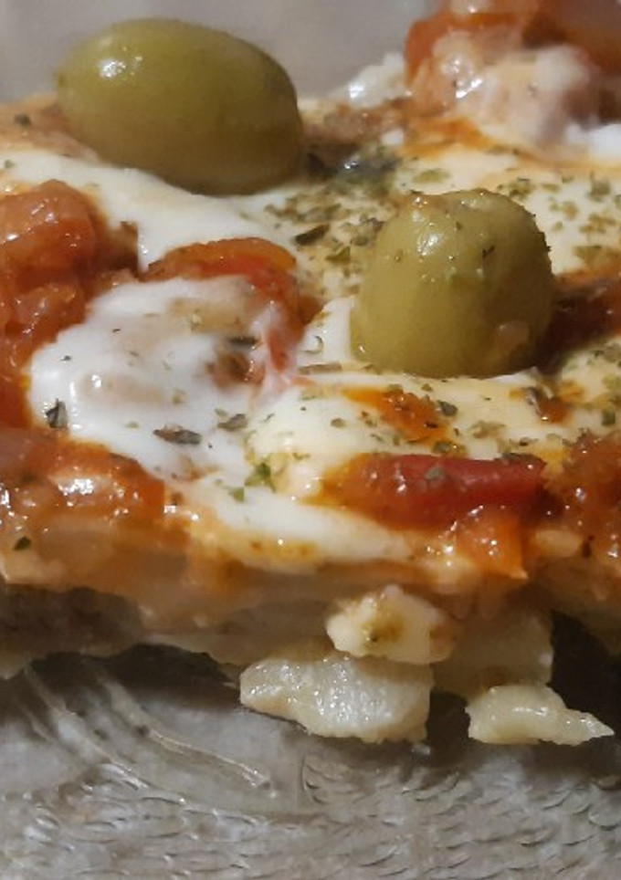 Una foto de Pizza de berenjenas 😋🍆