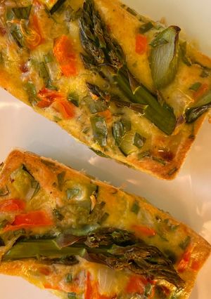 A picture of Mini Quiches with Asparagus and Spring Vegetables.