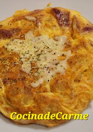 A picture of Spanish Potato Omelette with Ham and Cheese.