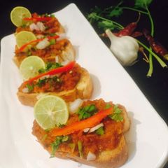 Pav bhaji bruschetta A picture of Pav bhaji bruschetta.