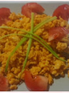Foto principal de Huevos revueltos con tomate