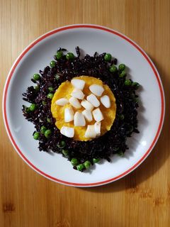 Foto di Purè di zucca con totani e riso venere