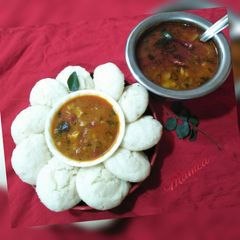 A picture of Rawa Idli with Sambhar.