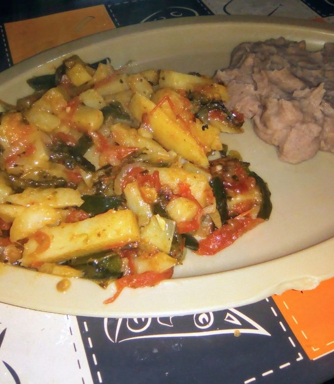 Una foto de Papas con rajas a la mexicana