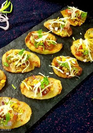 A picture of Grilled Aloo slice chaat.