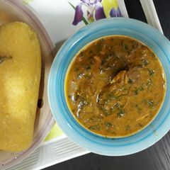 A picture of Ogbono soup with garri.