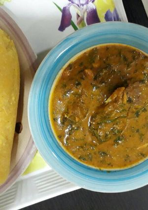 A picture of Ogbono soup with garri.