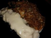 Una foto de canelones de carne picada y espinacas