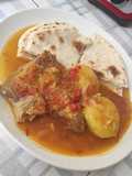 Sobrebarriga guisada con arepa ocañera