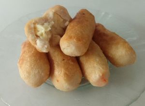 Una foto de Palitos rellenos de queso