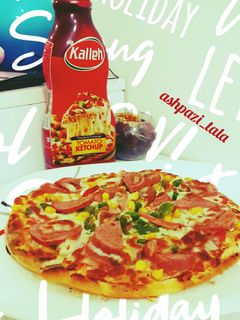 عکسی از دستور پیتزا با خمیر خونگی