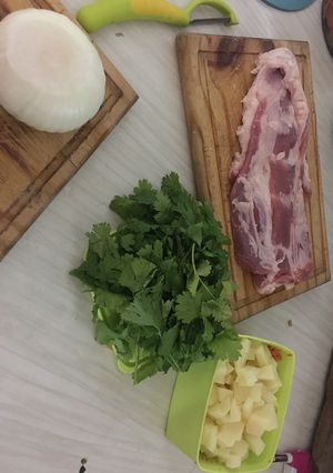 Una foto de Pechito de cerdo con arroz basmati